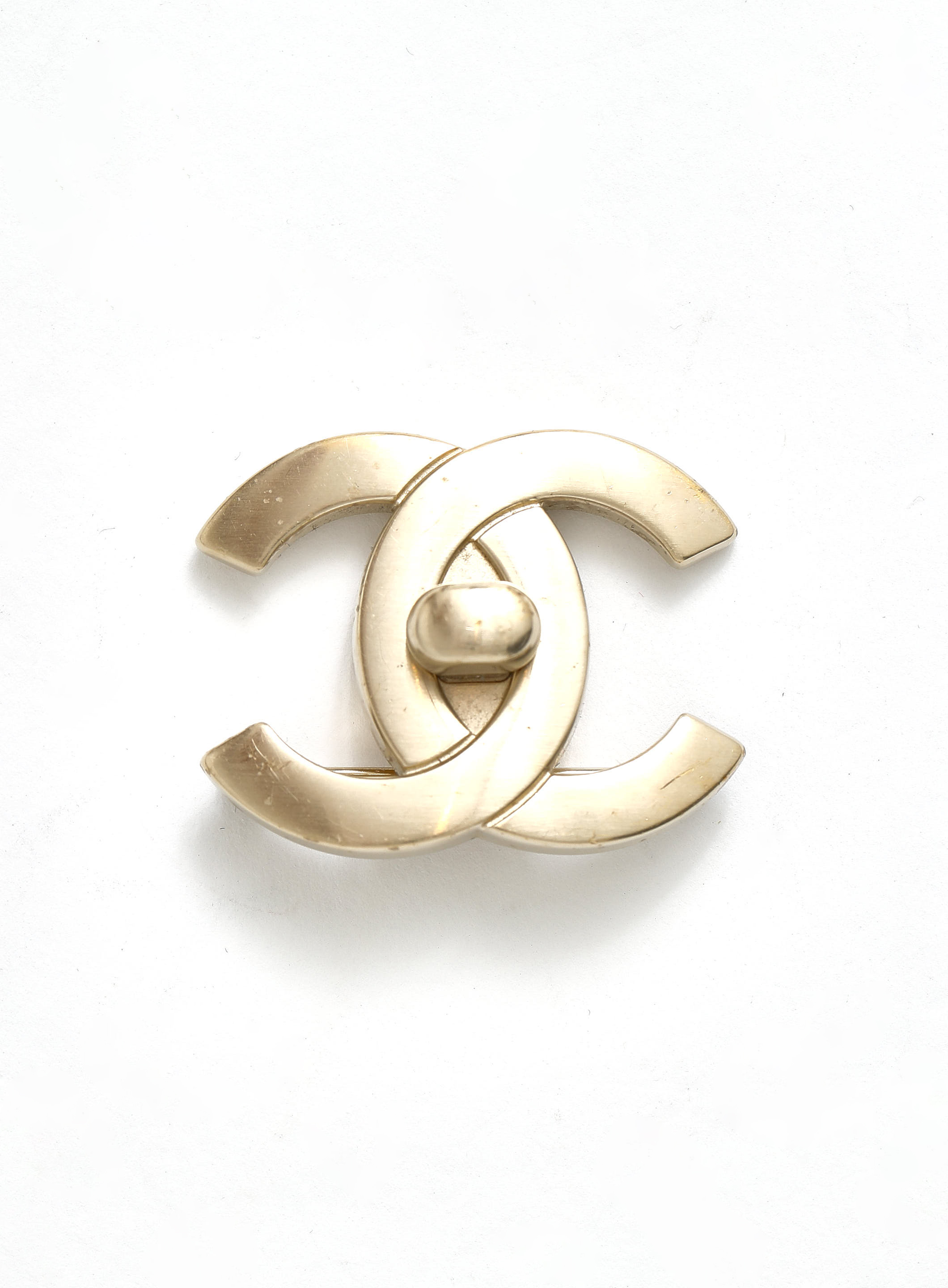 Chanel Vintage Turn-Lock Logo Brooch (Silver)